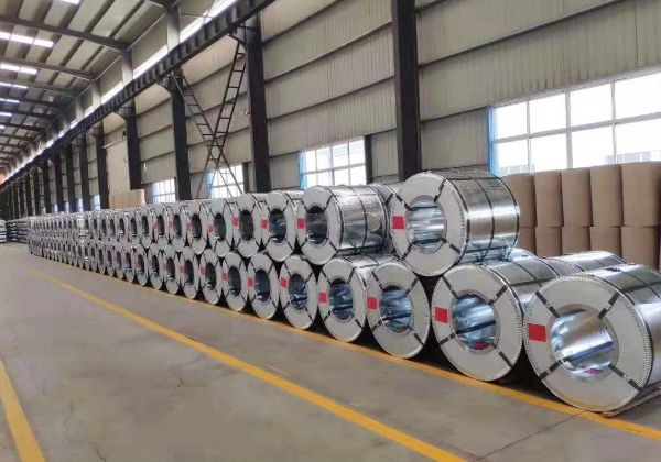 Several rolls of steel plates in the warehouse.